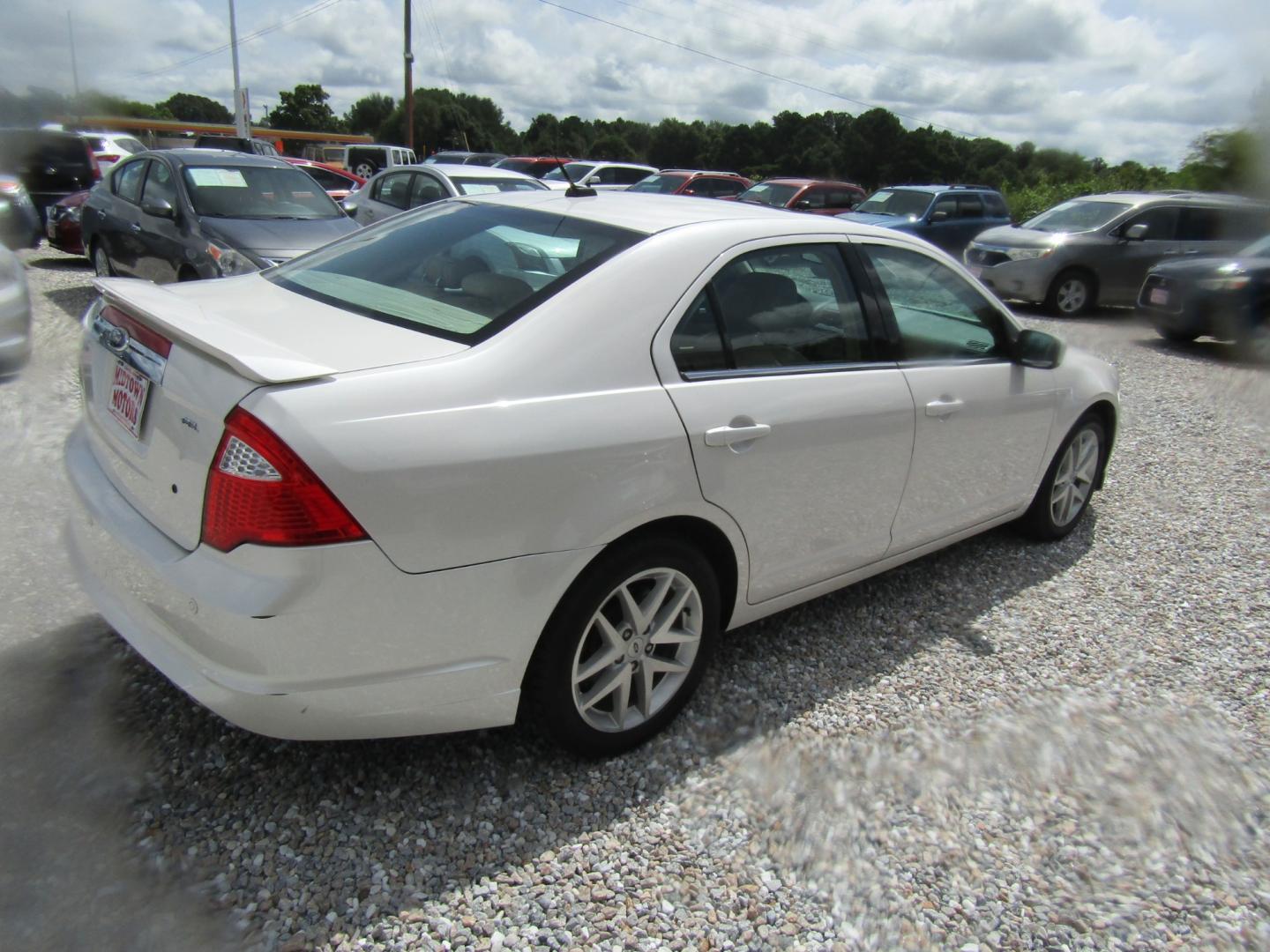 2012 White /Tan Ford Fusion SEL (3FAHP0JA4CR) with an 2.5L L4 DOHC 16V engine, Automatic transmission, located at 15016 S Hwy 231, Midland City, AL, 36350, (334) 983-3001, 31.306210, -85.495277 - Photo#7