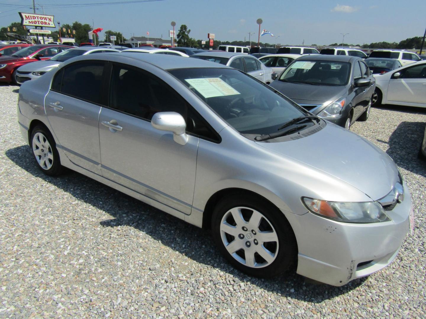 2010 Silver Honda Civic LX Sedan 5-Speed AT (19XFA1F51AE) with an 1.8L L4 SOHC 16V engine, Automatic transmission, located at 15016 S Hwy 231, Midland City, AL, 36350, (334) 983-3001, 31.306210, -85.495277 - Photo#0