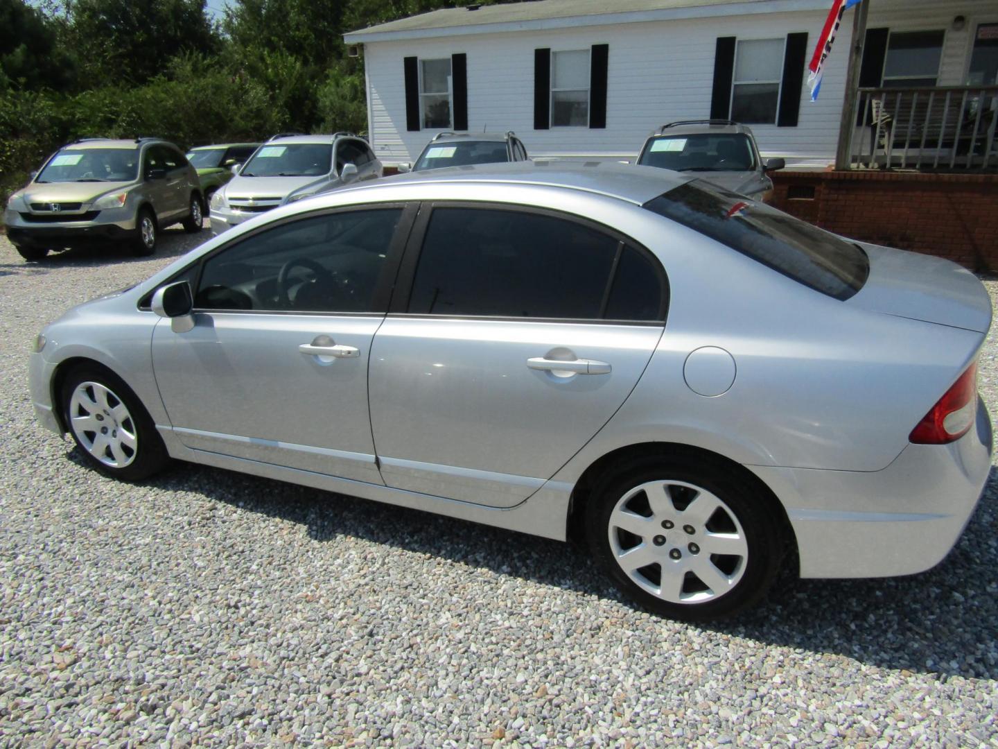 2010 Silver Honda Civic LX Sedan 5-Speed AT (19XFA1F51AE) with an 1.8L L4 SOHC 16V engine, Automatic transmission, located at 15016 S Hwy 231, Midland City, AL, 36350, (334) 983-3001, 31.306210, -85.495277 - Photo#5