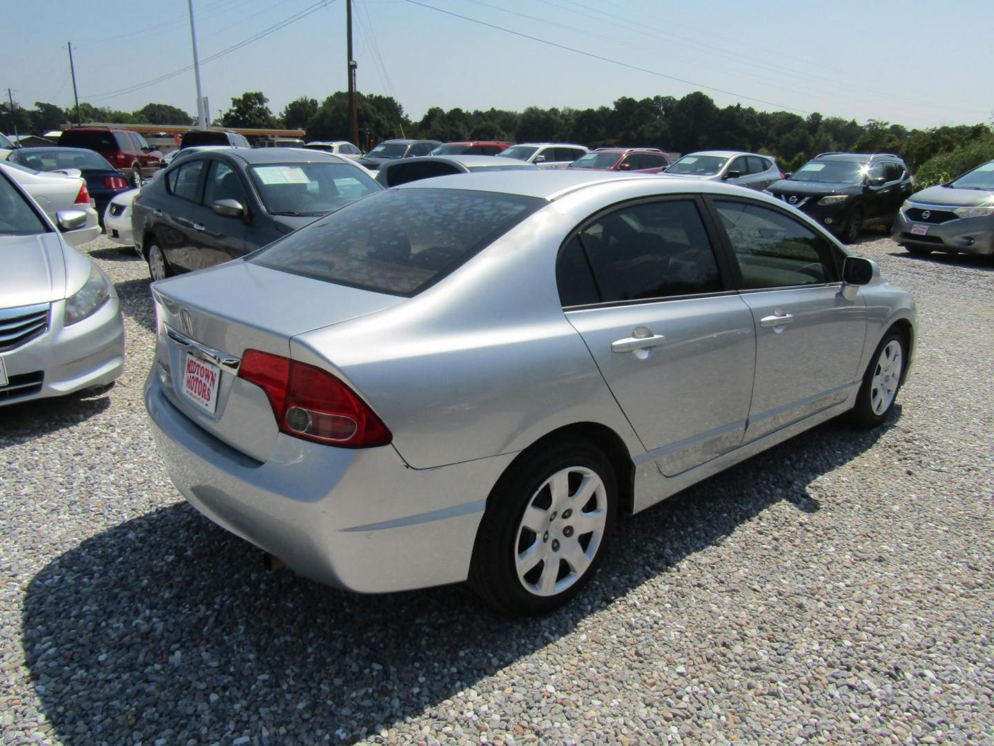 2010 Silver Honda Civic LX Sedan 5-Speed AT (19XFA1F51AE) with an 1.8L L4 SOHC 16V engine, Automatic transmission, located at 15016 S Hwy 231, Midland City, AL, 36350, (334) 983-3001, 31.306210, -85.495277 - Photo#7