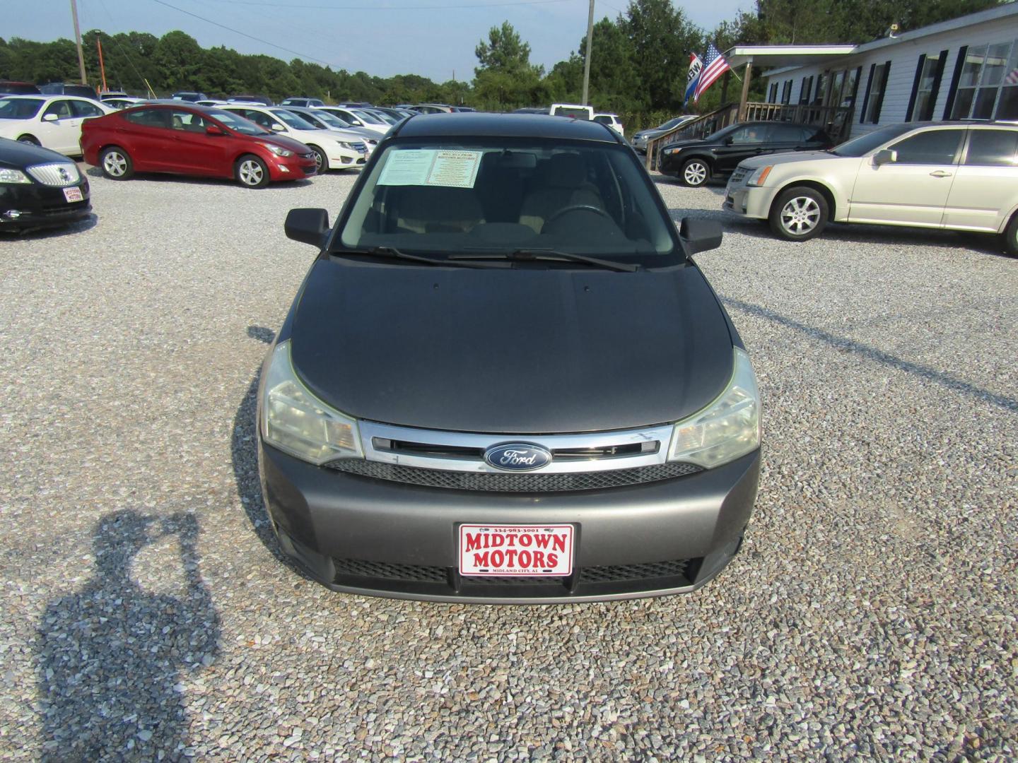 2010 Gray Ford Focus SE Sedan (1FAHP3FN6AW) with an 2.0L L4 DOHC 16V engine, Automatic transmission, located at 15016 S Hwy 231, Midland City, AL, 36350, (334) 983-3001, 31.306210, -85.495277 - Photo#1