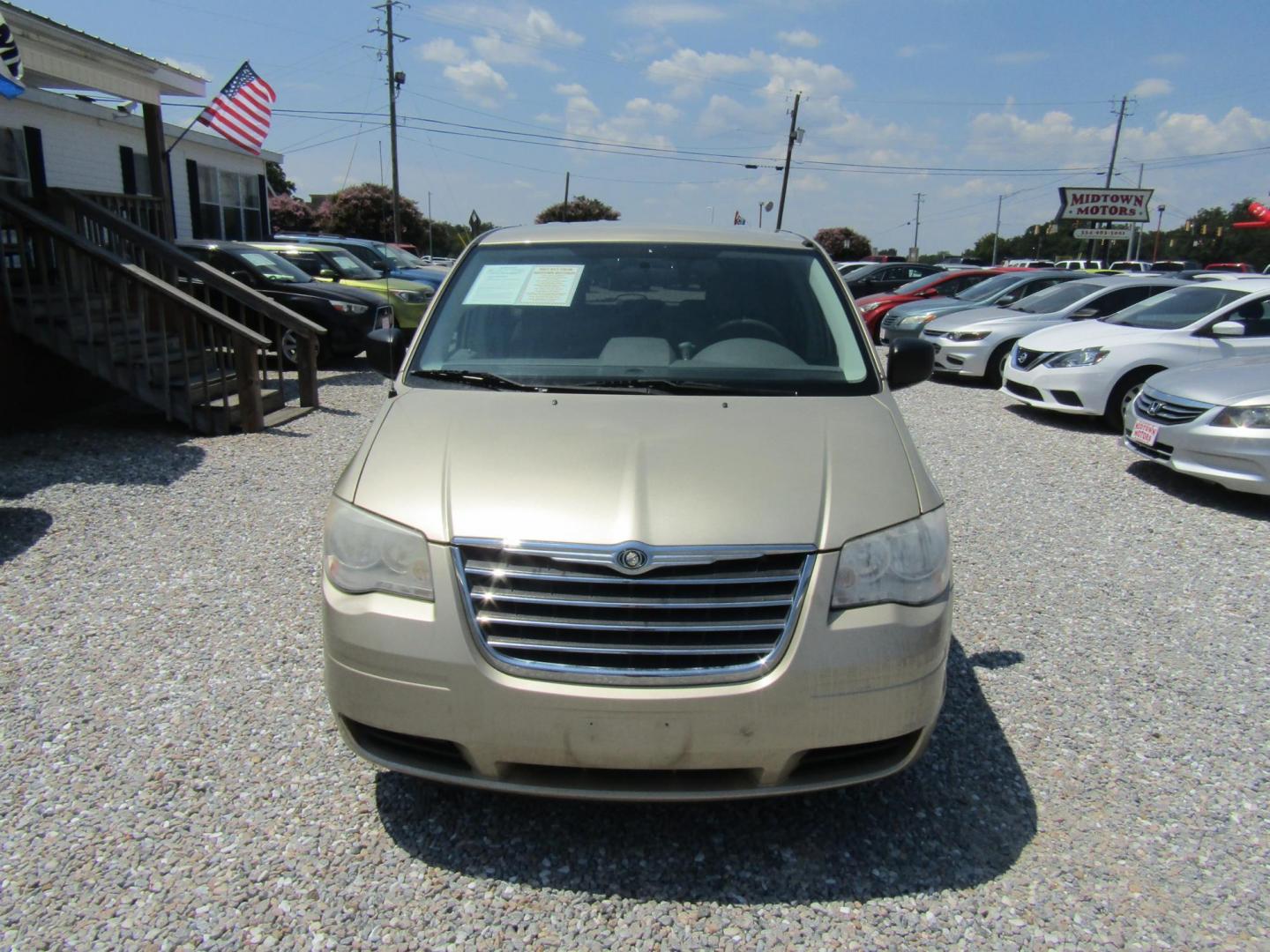 2010 Chrysler Town & Country Voyager (2A4RR2D16AR) with an 3.8L V6 OHV 12V engine, Automatic transmission, located at 15016 S Hwy 231, Midland City, AL, 36350, (334) 983-3001, 31.306210, -85.495277 - Photo#1