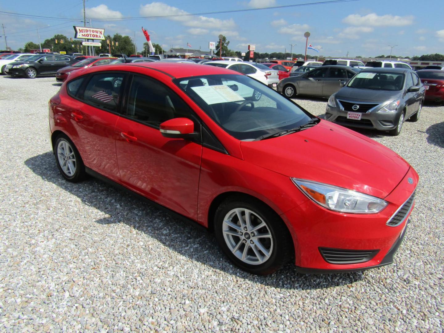 2016 Ford Focus SE Hatch (1FADP3K24GL) with an 2.0L L4 DOHC 16V engine, Automatic transmission, located at 15016 S Hwy 231, Midland City, AL, 36350, (334) 983-3001, 31.306210, -85.495277 - Photo#0