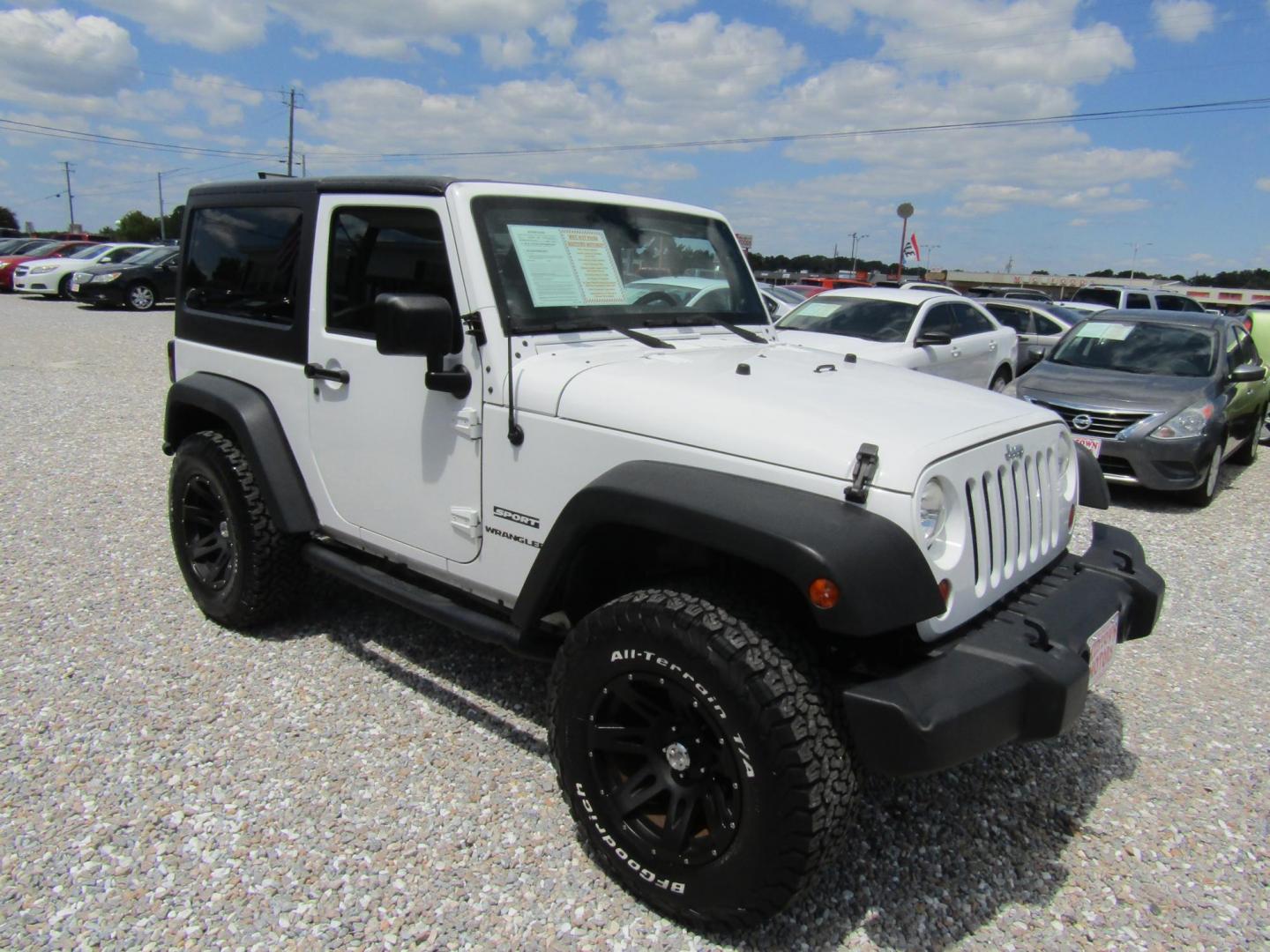 2012 White Jeep Wrangler Sport 4WD (1C4AJWAG6CL) with an 3.6L V6 DOHC 24V FFV engine, Automatic transmission, located at 15016 S Hwy 231, Midland City, AL, 36350, (334) 983-3001, 31.306210, -85.495277 - Photo#0