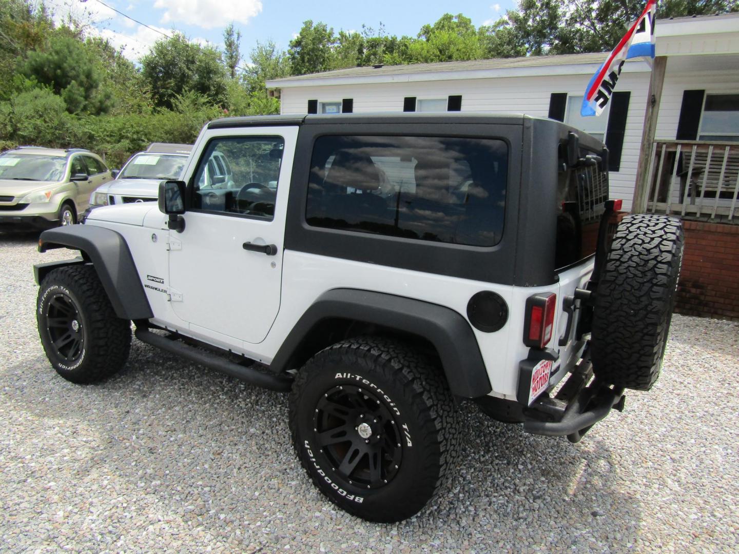 2012 White Jeep Wrangler Sport 4WD (1C4AJWAG6CL) with an 3.6L V6 DOHC 24V FFV engine, Automatic transmission, located at 15016 S Hwy 231, Midland City, AL, 36350, (334) 983-3001, 31.306210, -85.495277 - Photo#4