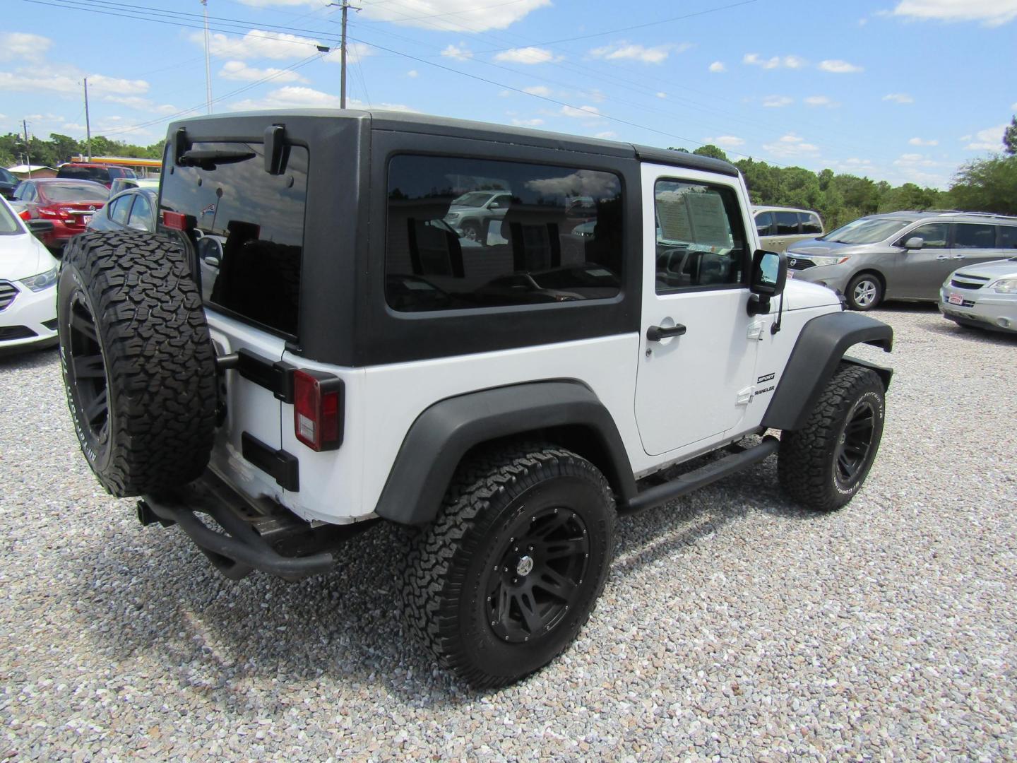 2012 White Jeep Wrangler Sport 4WD (1C4AJWAG6CL) with an 3.6L V6 DOHC 24V FFV engine, Automatic transmission, located at 15016 S Hwy 231, Midland City, AL, 36350, (334) 983-3001, 31.306210, -85.495277 - Photo#6