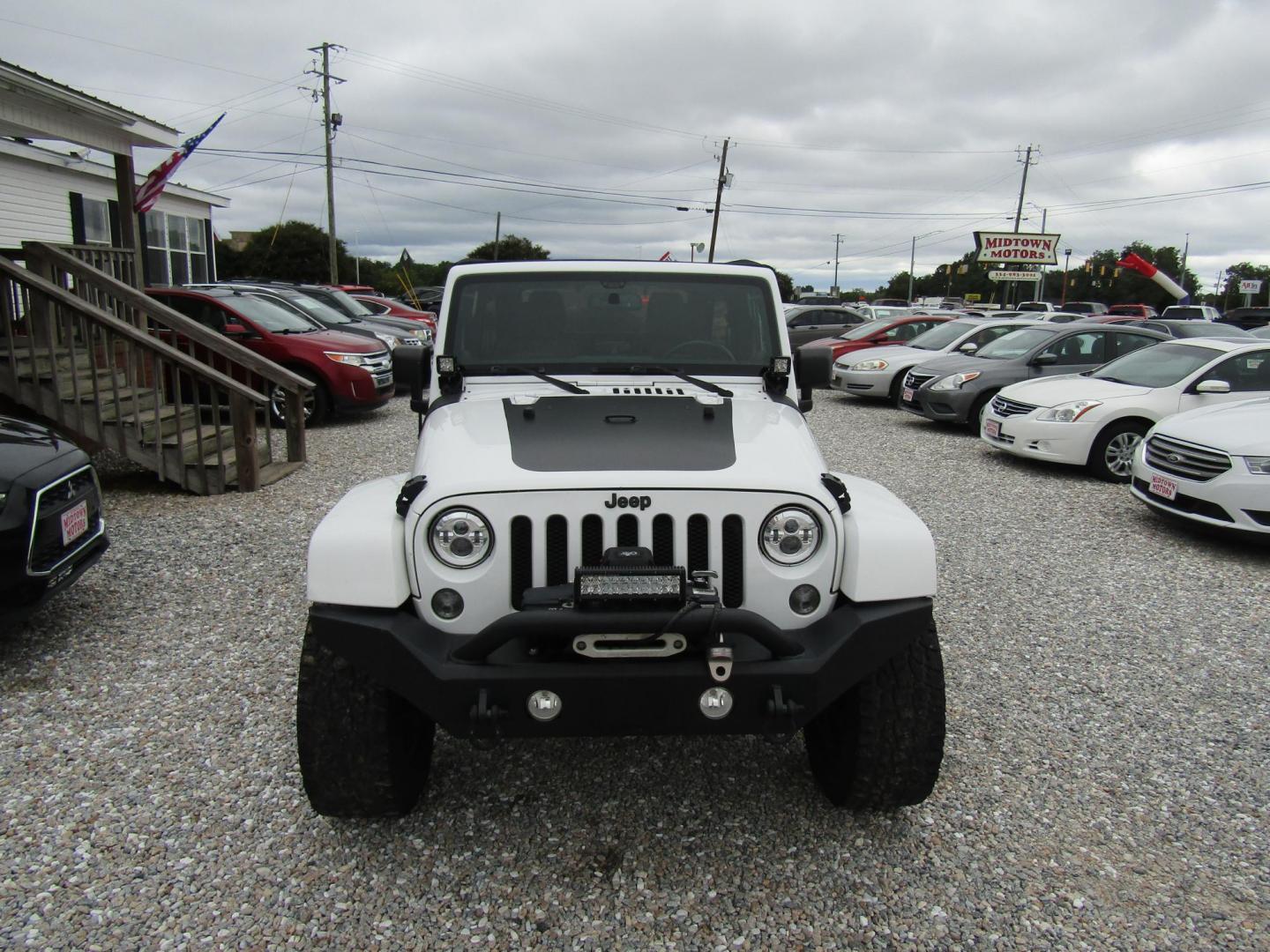 2014 White Jeep Wrangler Unlimited Sahara 4WD (1C4BJWEG0EL) with an 3.6L V6 DOHC 24V FFV engine, Automatic transmission, located at 15016 S Hwy 231, Midland City, AL, 36350, (334) 983-3001, 31.306210, -85.495277 - Photo#1