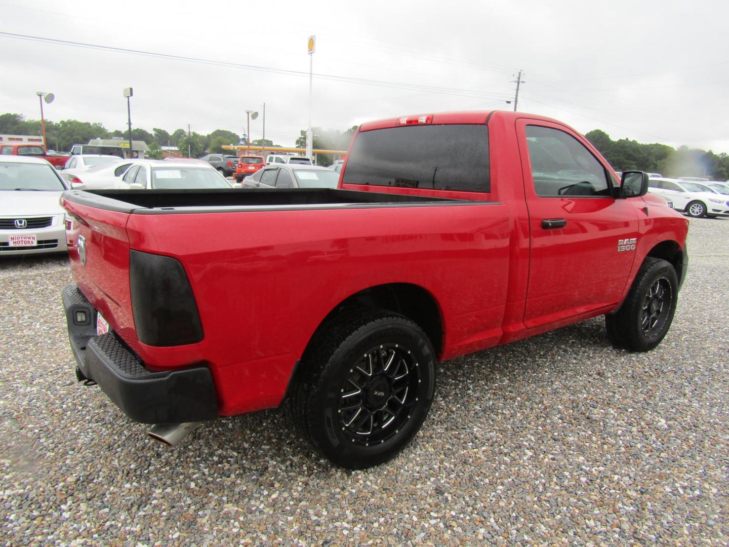 2016 Red RAM 1500 Tradesman Regular Cab SWB 2WD (3C6JR6AG8GG) with an 3.6L V6 DOHC 24V FFV engine, Automatic transmission, located at 15016 S Hwy 231, Midland City, AL, 36350, (334) 983-3001, 31.306210, -85.495277 - Photo#6