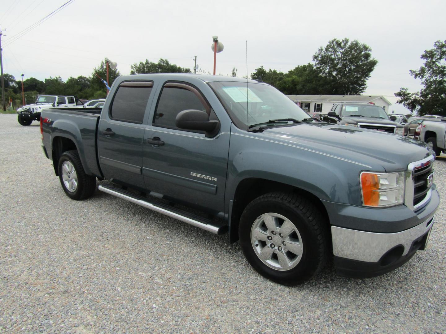 2012 Gray GMC Sierra 1500 SLE Crew Cab 2WD (3GTP1VE05CG) with an 5.3L V8 OHV 16V FFV engine, Automatic transmission, located at 15016 S Hwy 231, Midland City, AL, 36350, (334) 983-3001, 31.306210, -85.495277 - Photo#0