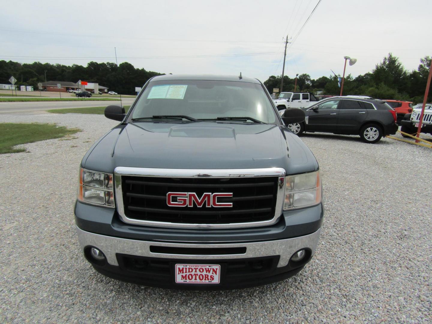 2012 Gray GMC Sierra 1500 SLE Crew Cab 2WD (3GTP1VE05CG) with an 5.3L V8 OHV 16V FFV engine, Automatic transmission, located at 15016 S Hwy 231, Midland City, AL, 36350, (334) 983-3001, 31.306210, -85.495277 - Photo#1