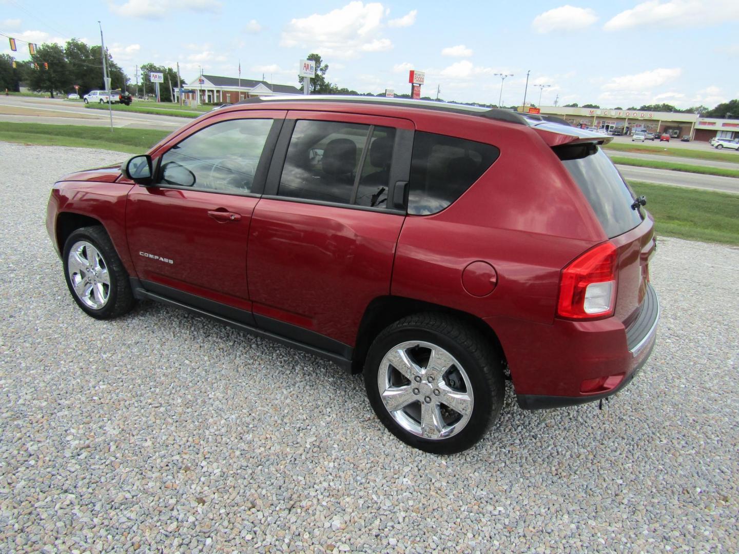 2013 Red Jeep Compass Limited FWD (1C4NJCCBXDD) with an 2.4L L4 DOHC 16V engine, Automatic transmission, located at 15016 S Hwy 231, Midland City, AL, 36350, (334) 983-3001, 31.306210, -85.495277 - Photo#5