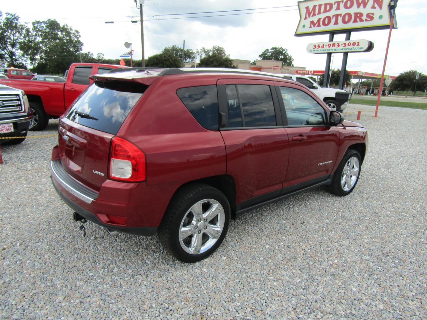 2013 Red Jeep Compass Limited FWD (1C4NJCCBXDD) with an 2.4L L4 DOHC 16V engine, Automatic transmission, located at 15016 S Hwy 231, Midland City, AL, 36350, (334) 983-3001, 31.306210, -85.495277 - Photo#7