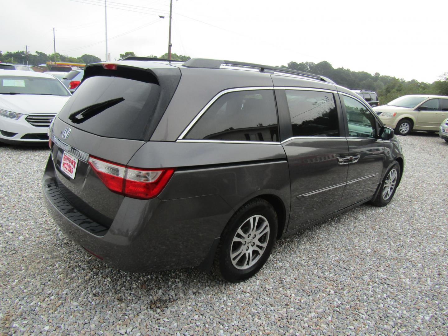 2012 Gray Honda Odyssey EX (5FNRL5H4XCB) with an 3.5L V6 SOHC 24V engine, Automatic transmission, located at 15016 S Hwy 231, Midland City, AL, 36350, (334) 983-3001, 31.306210, -85.495277 - Photo#5