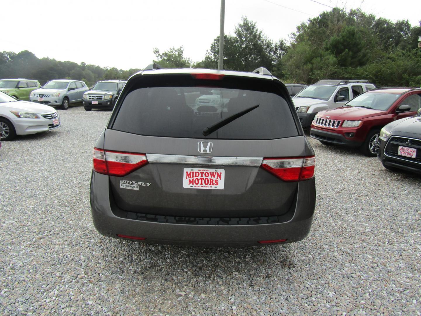 2012 Gray Honda Odyssey EX (5FNRL5H4XCB) with an 3.5L V6 SOHC 24V engine, Automatic transmission, located at 15016 S Hwy 231, Midland City, AL, 36350, (334) 983-3001, 31.306210, -85.495277 - Photo#7