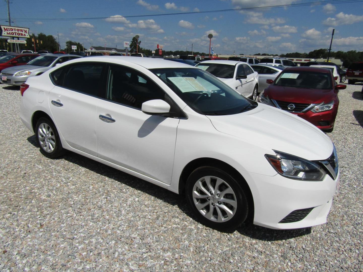 2019 White Nissan Sentra S CVT (3N1AB7AP5KY) with an 1.8L L4 SFI DOHC 16V engine, Automatic transmission, located at 15016 S Hwy 231, Midland City, AL, 36350, (334) 983-3001, 31.306210, -85.495277 - Photo#0