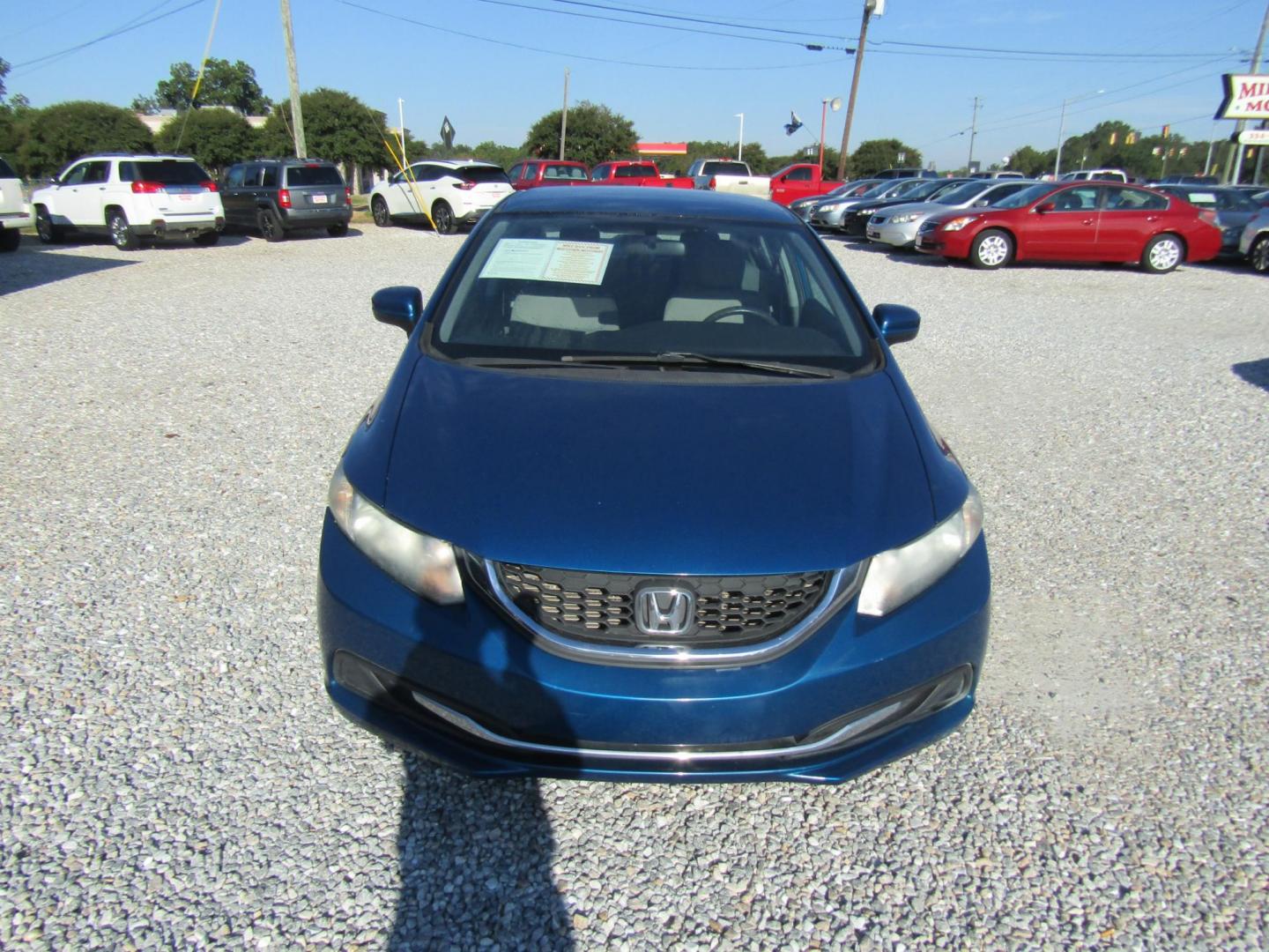 2015 Blue Honda Civic LX Sedan CVT (19XFB2F50FE) with an 1.8L L4 SOHC 16V engine, Automatic transmission, located at 15016 S Hwy 231, Midland City, AL, 36350, (334) 983-3001, 31.306210, -85.495277 - Photo#1