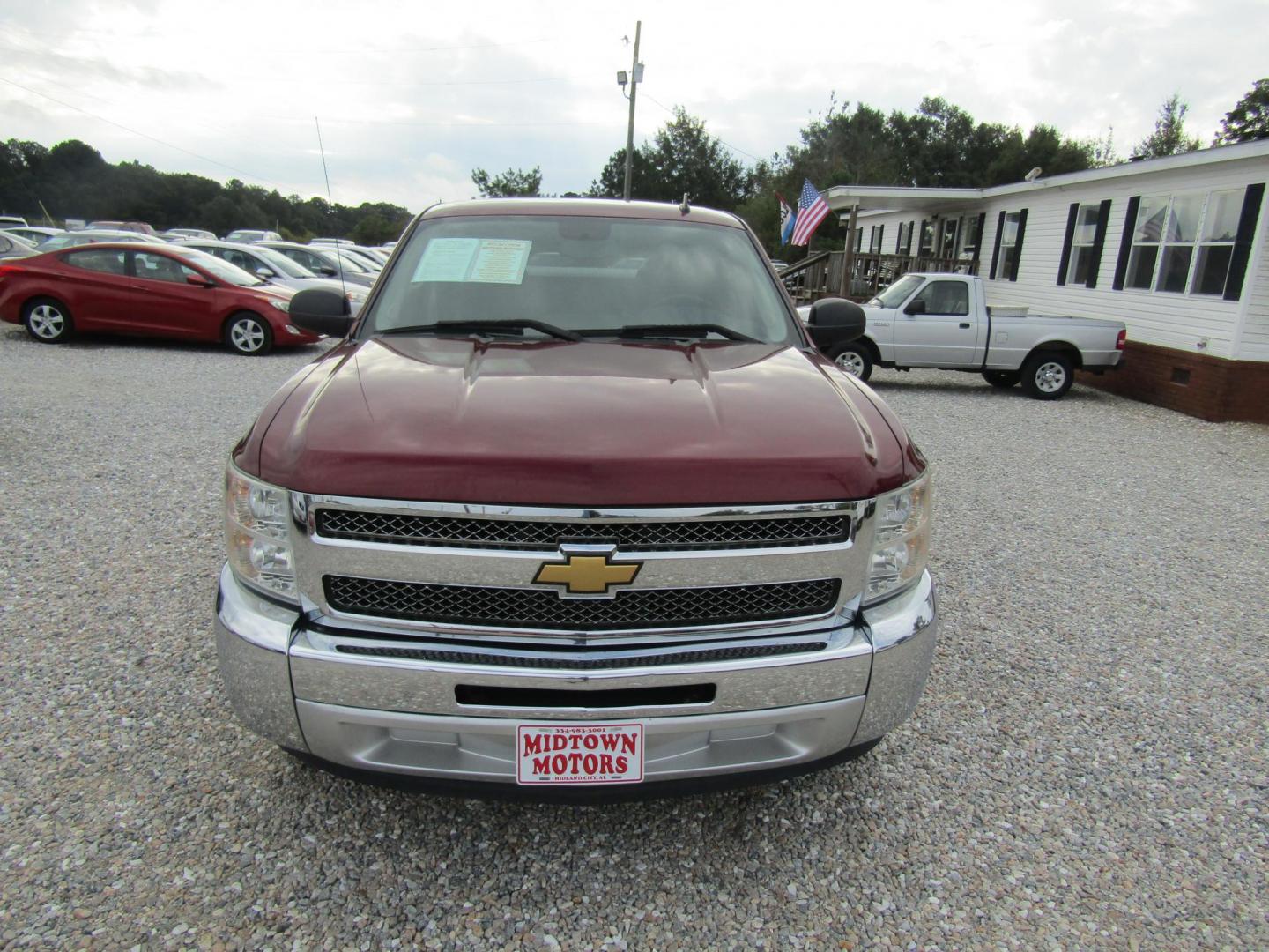 2013 Red Chevrolet Silverado 1500 LT Ext. Cab Long Box 2WD (1GCRCSEA4DZ) with an 4.8L V8 OHV 16V engine, Automatic transmission, located at 15016 S Hwy 231, Midland City, AL, 36350, (334) 983-3001, 31.306210, -85.495277 - Photo#1