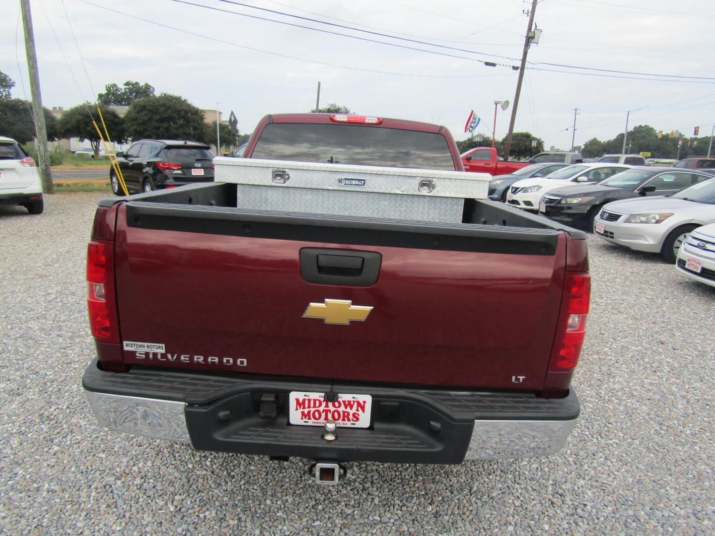 2013 Red Chevrolet Silverado 1500 LT Ext. Cab Long Box 2WD (1GCRCSEA4DZ) with an 4.8L V8 OHV 16V engine, Automatic transmission, located at 15016 S Hwy 231, Midland City, AL, 36350, (334) 983-3001, 31.306210, -85.495277 - Photo#6