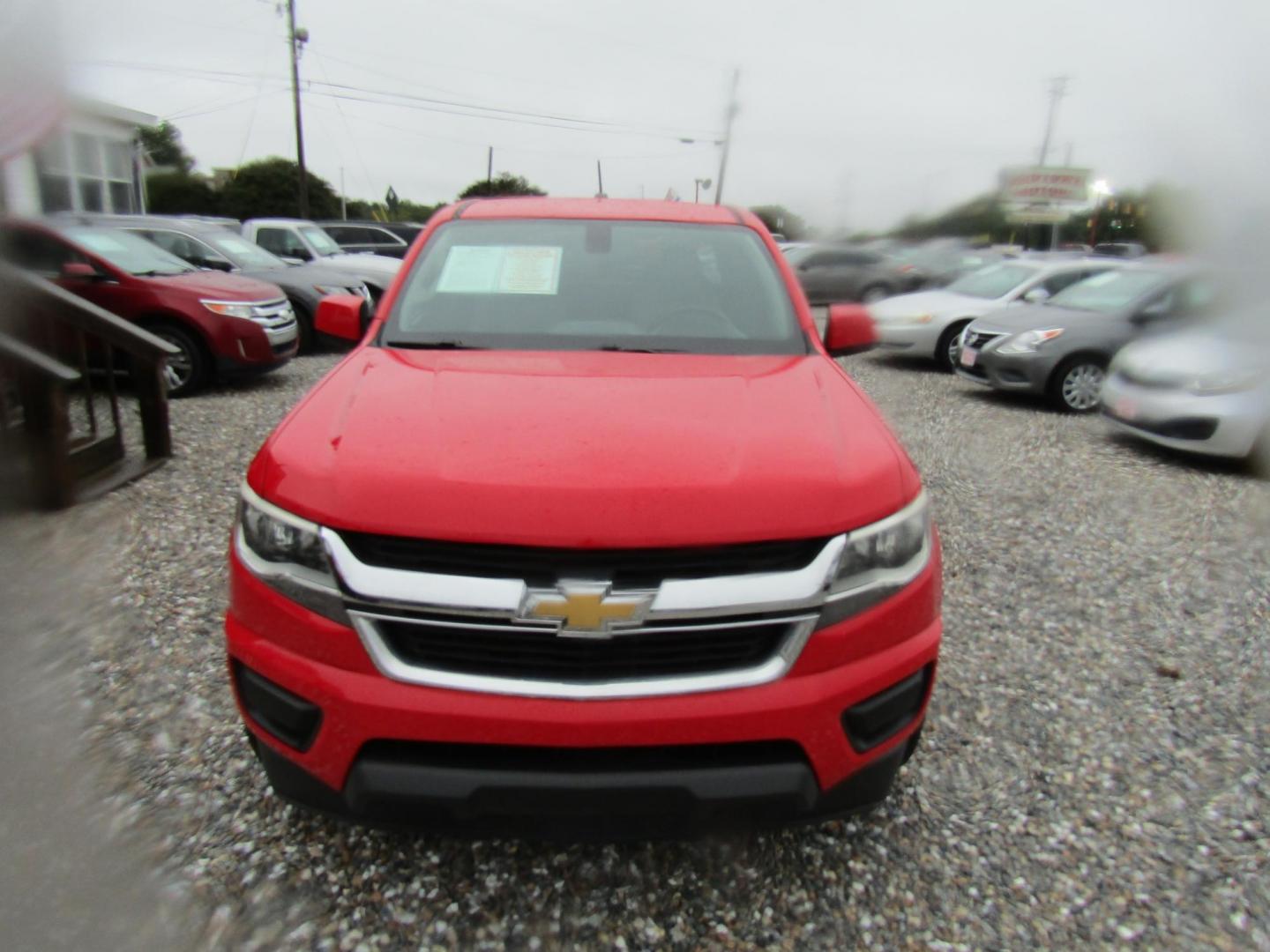 2015 Red Chevrolet Colorado WT Ext. Cab 2WD (1GCHSAE39F1) with an 3.6L V6 DOHC 24V GAS engine, Automatic transmission, located at 15016 S Hwy 231, Midland City, AL, 36350, (334) 983-3001, 31.306210, -85.495277 - Photo#1