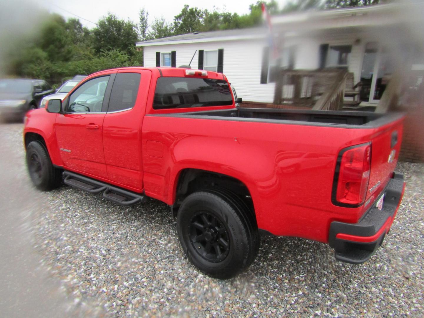 2015 Red Chevrolet Colorado WT Ext. Cab 2WD (1GCHSAE39F1) with an 3.6L V6 DOHC 24V GAS engine, Automatic transmission, located at 15016 S Hwy 231, Midland City, AL, 36350, (334) 983-3001, 31.306210, -85.495277 - Photo#5