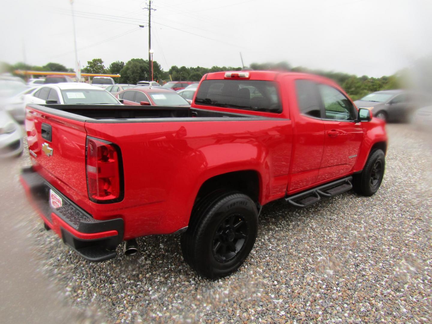 2015 Red Chevrolet Colorado WT Ext. Cab 2WD (1GCHSAE39F1) with an 3.6L V6 DOHC 24V GAS engine, Automatic transmission, located at 15016 S Hwy 231, Midland City, AL, 36350, (334) 983-3001, 31.306210, -85.495277 - Photo#6