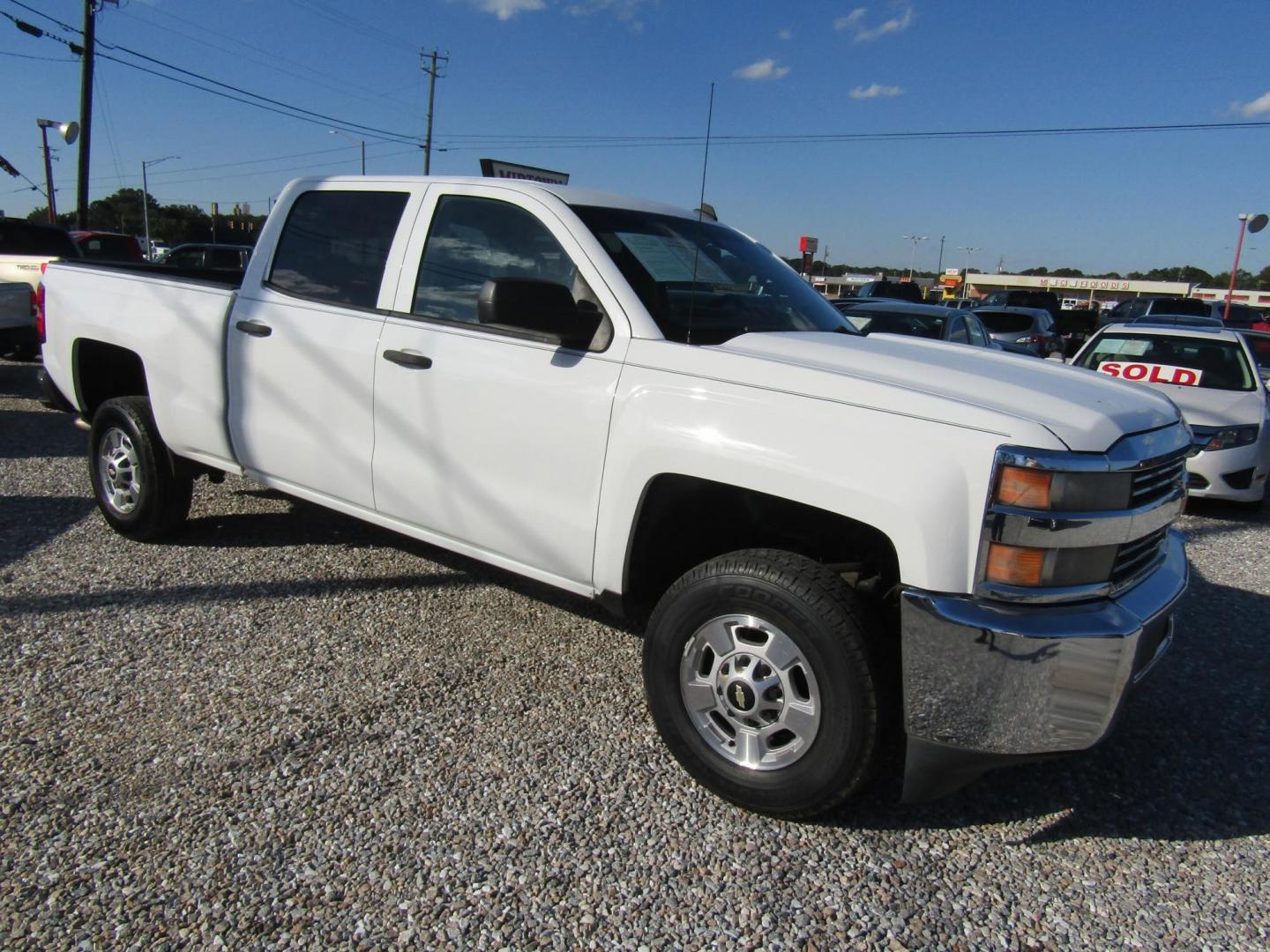 2015 White /Gray Chevrolet Silverado 2500HD LT Crew Cab Long Box 2WD (1GC1CVEG7FF) with an 6.0L V8 OHV 16V FFV engine, 6-Speed Automatic transmission, located at 15016 S Hwy 231, Midland City, AL, 36350, (334) 983-3001, 31.306210, -85.495277 - Photo#0