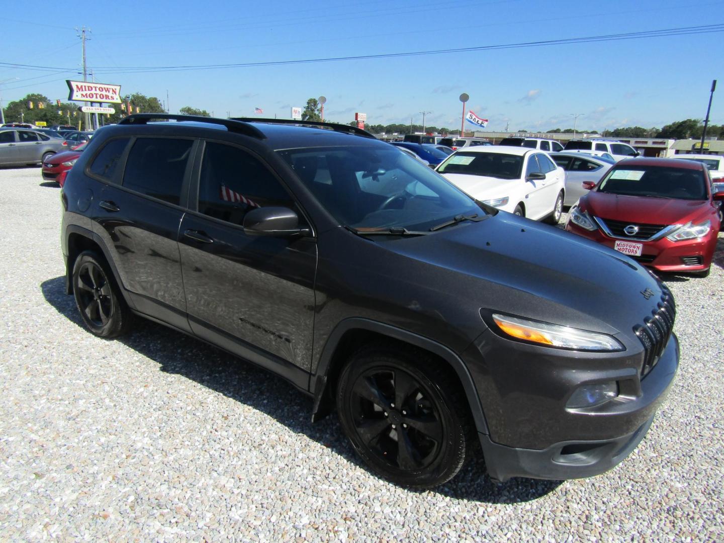 2016 Black Jeep Cherokee Limited FWD (1C4PJLDSXGW) with an 3.2L V6 DOHC 24V engine, Automatic transmission, located at 15016 S Hwy 231, Midland City, AL, 36350, (334) 983-3001, 31.306210, -85.495277 - Photo#0