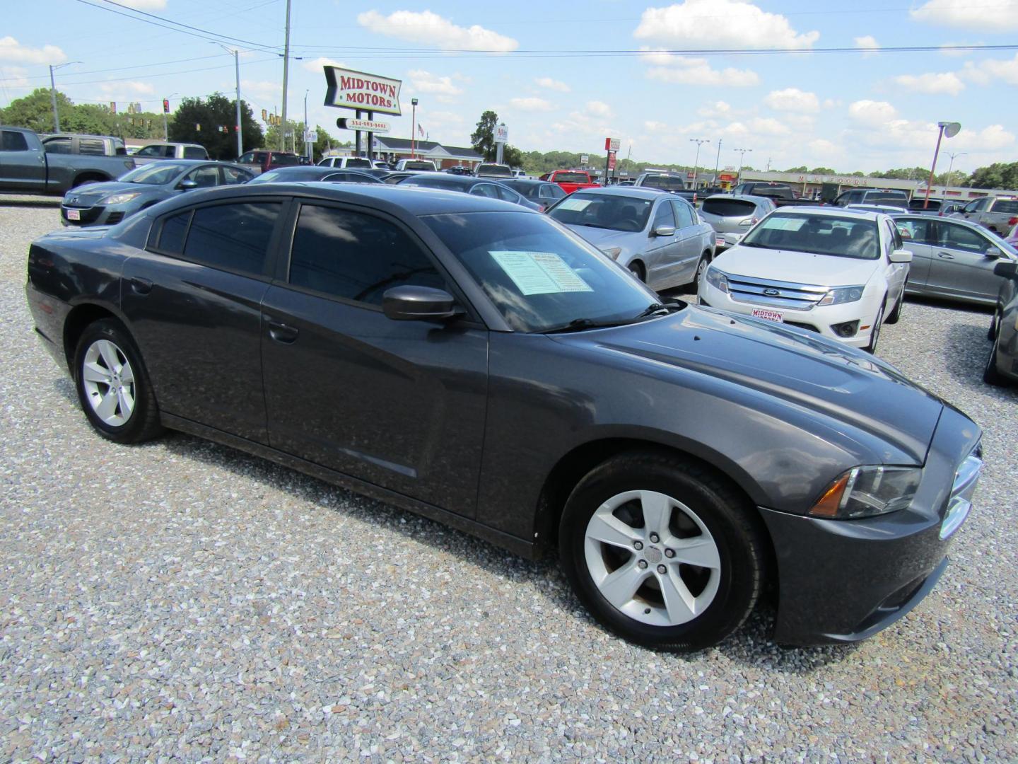 2014 Gray Dodge Charger SE (2C3CDXBG8EH) with an 3.6L V6 DOHC 24V engine, Automatic transmission, located at 15016 S Hwy 231, Midland City, AL, 36350, (334) 983-3001, 31.306210, -85.495277 - Photo#0