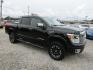 2017 Black Nissan Titan Platinum Reserve Crew Cab 4WD (1N6AA1E5XHN) with an 5.6L V8 DOHC 32V engine, Automatic transmission, located at 15016 S Hwy 231, Midland City, AL, 36350, (334) 983-3001, 31.306210, -85.495277 - Photo#0