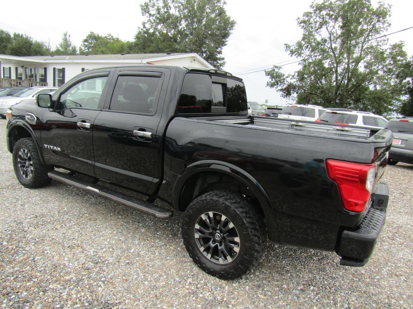 2017 Black Nissan Titan Platinum Reserve Crew Cab 4WD (1N6AA1E5XHN) with an 5.6L V8 DOHC 32V engine, Automatic transmission, located at 15016 S Hwy 231, Midland City, AL, 36350, (334) 983-3001, 31.306210, -85.495277 - Photo#5