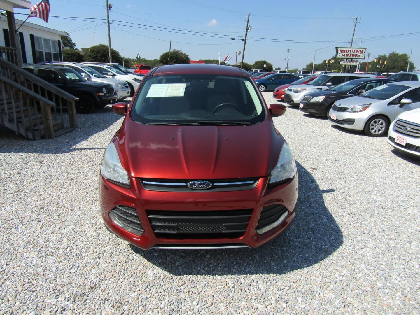 2015 Burgandy Ford Escape SE FWD (1FMCU0G72FU) with an 2.5L L4 DOHC 16V engine, Automatic transmission, located at 15016 S Hwy 231, Midland City, AL, 36350, (334) 983-3001, 31.306210, -85.495277 - Photo#1