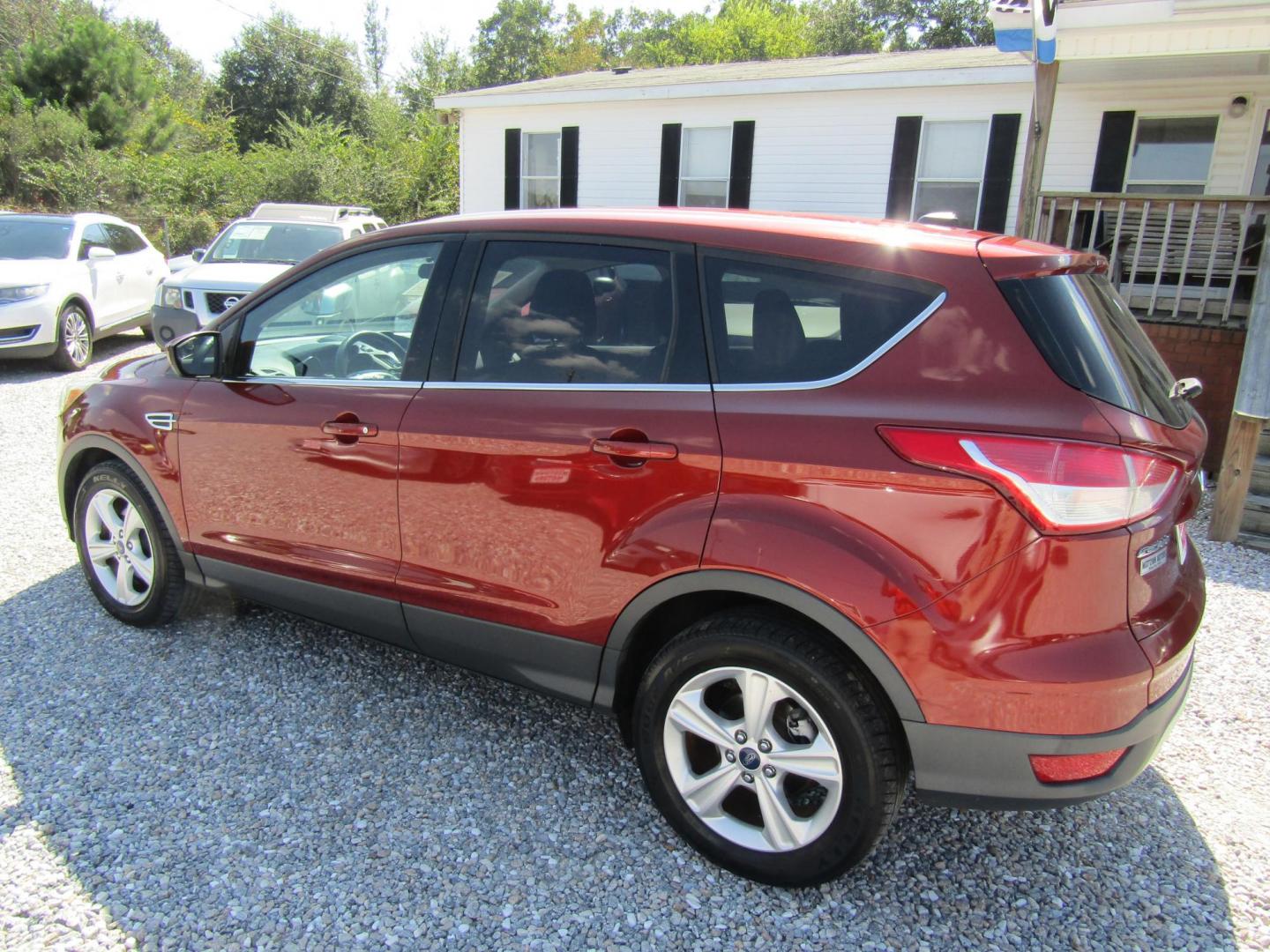 2015 Burgandy Ford Escape SE FWD (1FMCU0G72FU) with an 2.5L L4 DOHC 16V engine, Automatic transmission, located at 15016 S Hwy 231, Midland City, AL, 36350, (334) 983-3001, 31.306210, -85.495277 - Photo#7