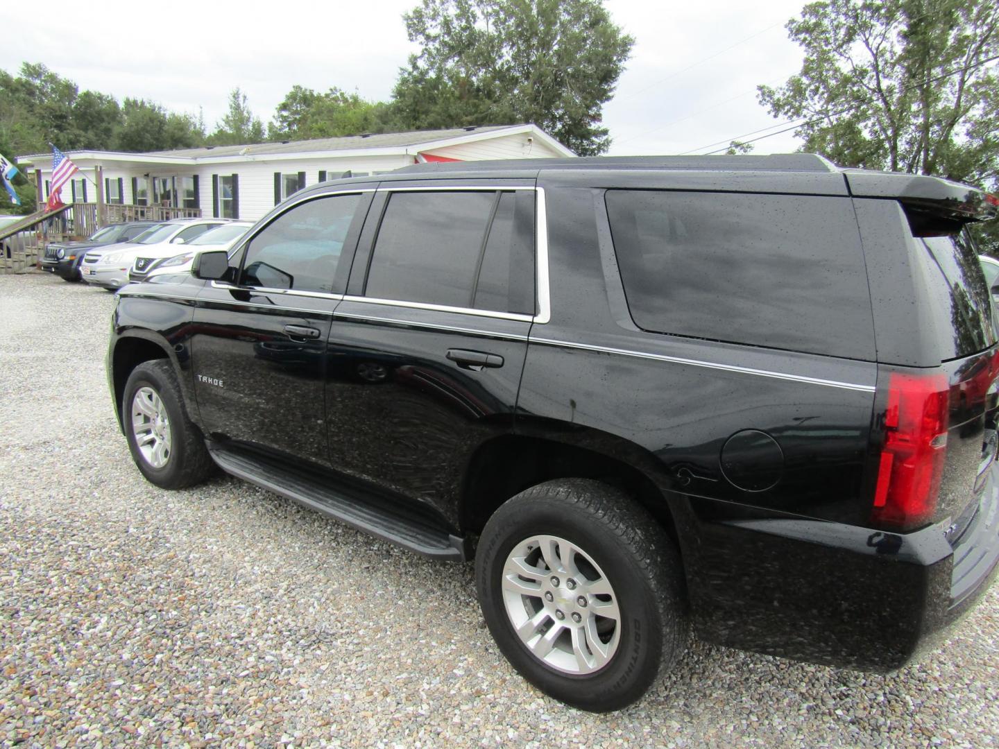 2017 Black Chevrolet Tahoe LS 2WD (1GNSCAKCXHR) with an 5.3L V8 OHV 16V engine, Automatic transmission, located at 15016 S Hwy 231, Midland City, AL, 36350, (334) 983-3001, 31.306210, -85.495277 - Photo#5