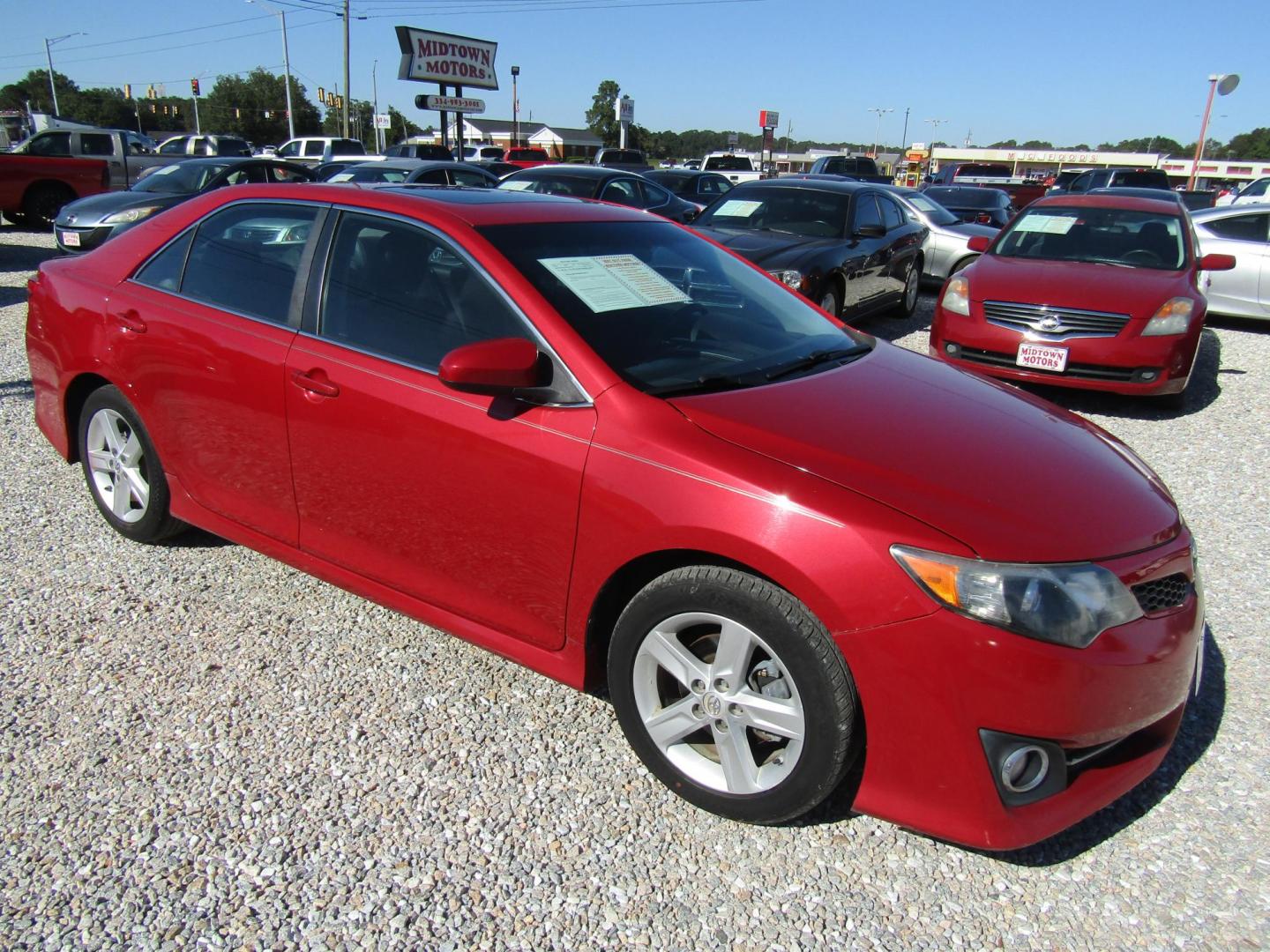 2012 Red Toyota Camry SE (4T1BF1FK0CU) with an 2.5L L4 DOHC 16V engine, Automatic transmission, located at 15016 S Hwy 231, Midland City, AL, 36350, (334) 983-3001, 31.306210, -85.495277 - Photo#0