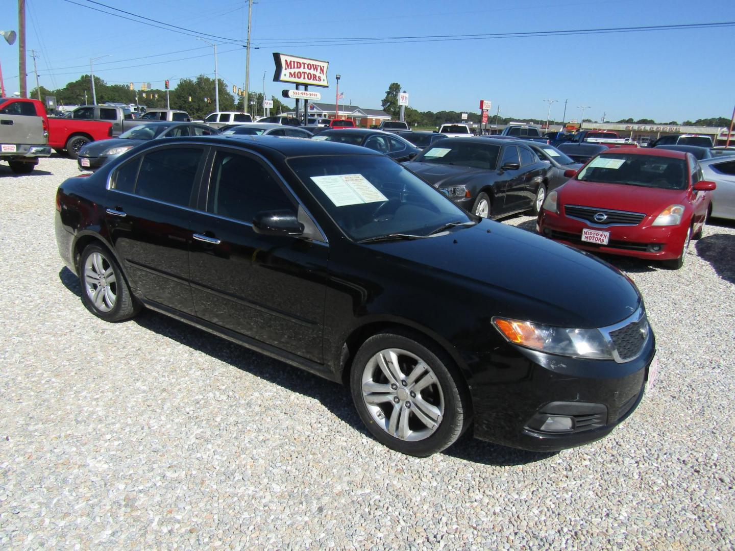 2007 Black Acura TSX 5-speed AT with Navigation (JH4CL96957C) with an 2.4L L4 DOHC 16V engine, Automatic transmission, located at 15016 S Hwy 231, Midland City, AL, 36350, (334) 983-3001, 31.306210, -85.495277 - Photo#0