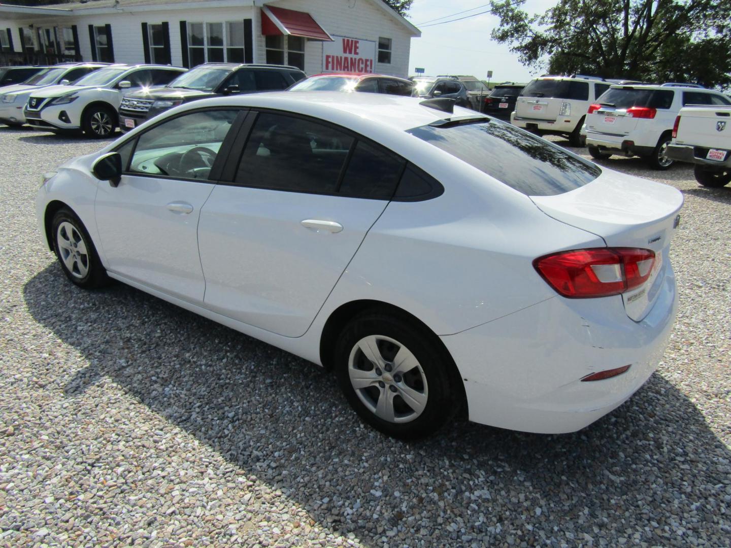 2018 White Chevrolet Cruze LS Auto (1G1BC5SM2J7) with an 1.4L L4 DOHC 16V TURBO engine, Automatic transmission, located at 15016 S Hwy 231, Midland City, AL, 36350, (334) 983-3001, 31.306210, -85.495277 - Photo#5