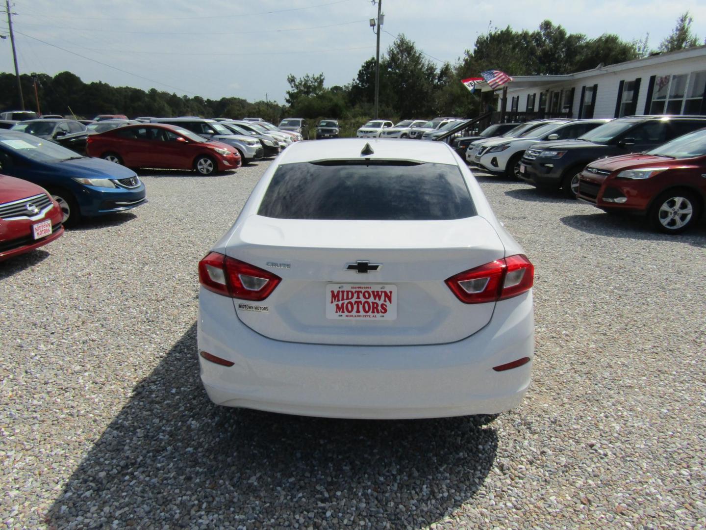 2018 White Chevrolet Cruze LS Auto (1G1BC5SM2J7) with an 1.4L L4 DOHC 16V TURBO engine, Automatic transmission, located at 15016 S Hwy 231, Midland City, AL, 36350, (334) 983-3001, 31.306210, -85.495277 - Photo#6