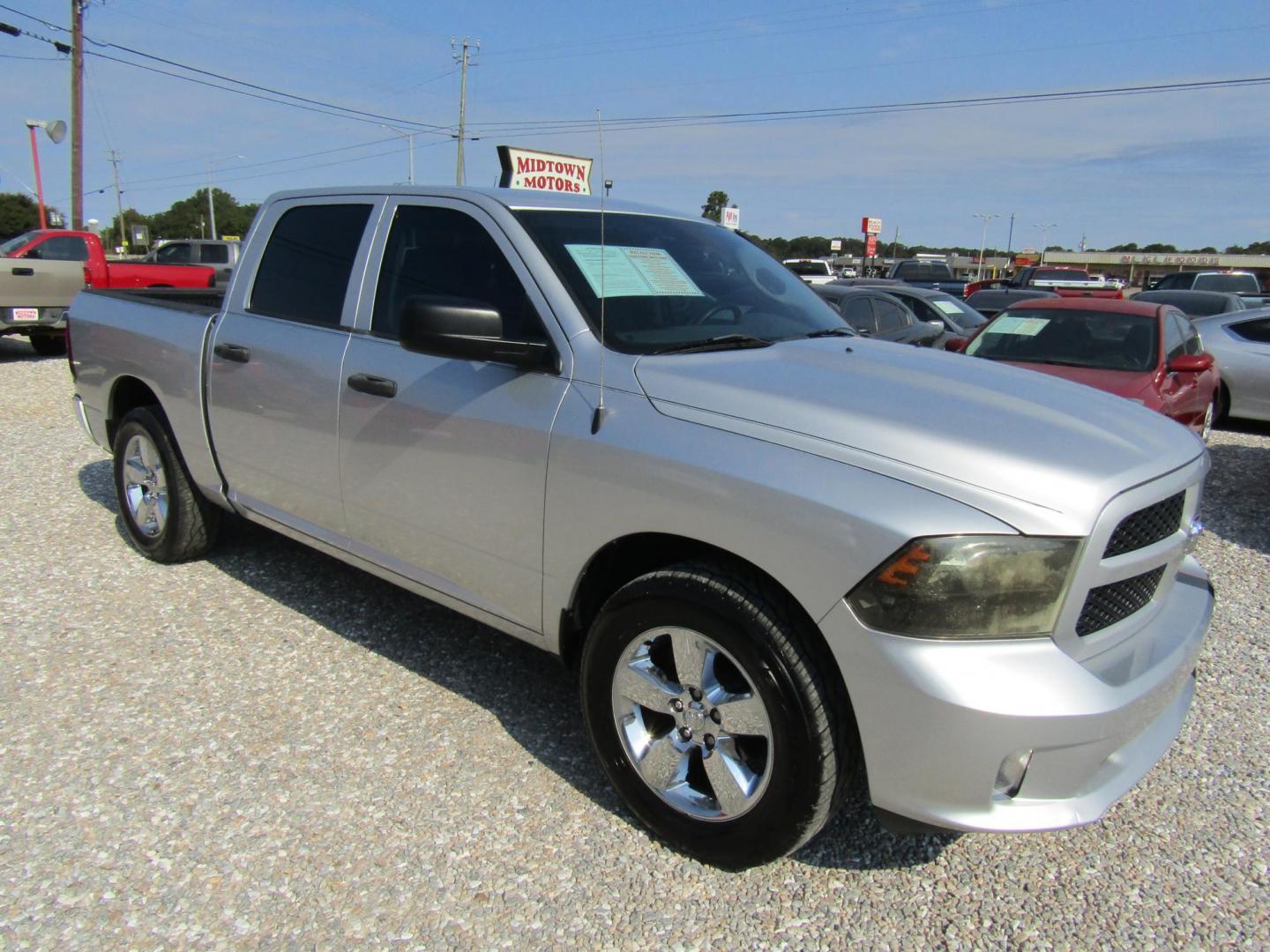 2015 Silver RAM 1500 Tradesman Crew Cab SWB 2WD (1C6RR6KTXFS) with an 5.7L V8 OHV 16V engine, Automatic transmission, located at 15016 S Hwy 231, Midland City, AL, 36350, (334) 983-3001, 31.306210, -85.495277 - Photo#0