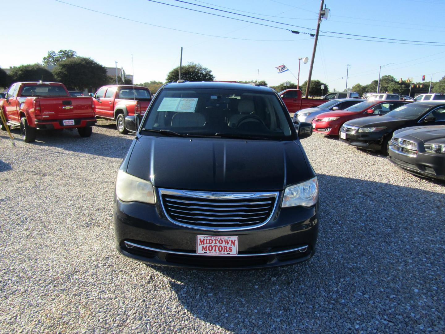 2013 Black Chrysler Town & Country Touring (2C4RC1BGXDR) with an 3.6L V6 DOHC 24V engine, Automatic transmission, located at 15016 S Hwy 231, Midland City, AL, 36350, (334) 983-3001, 31.306210, -85.495277 - Photo#1