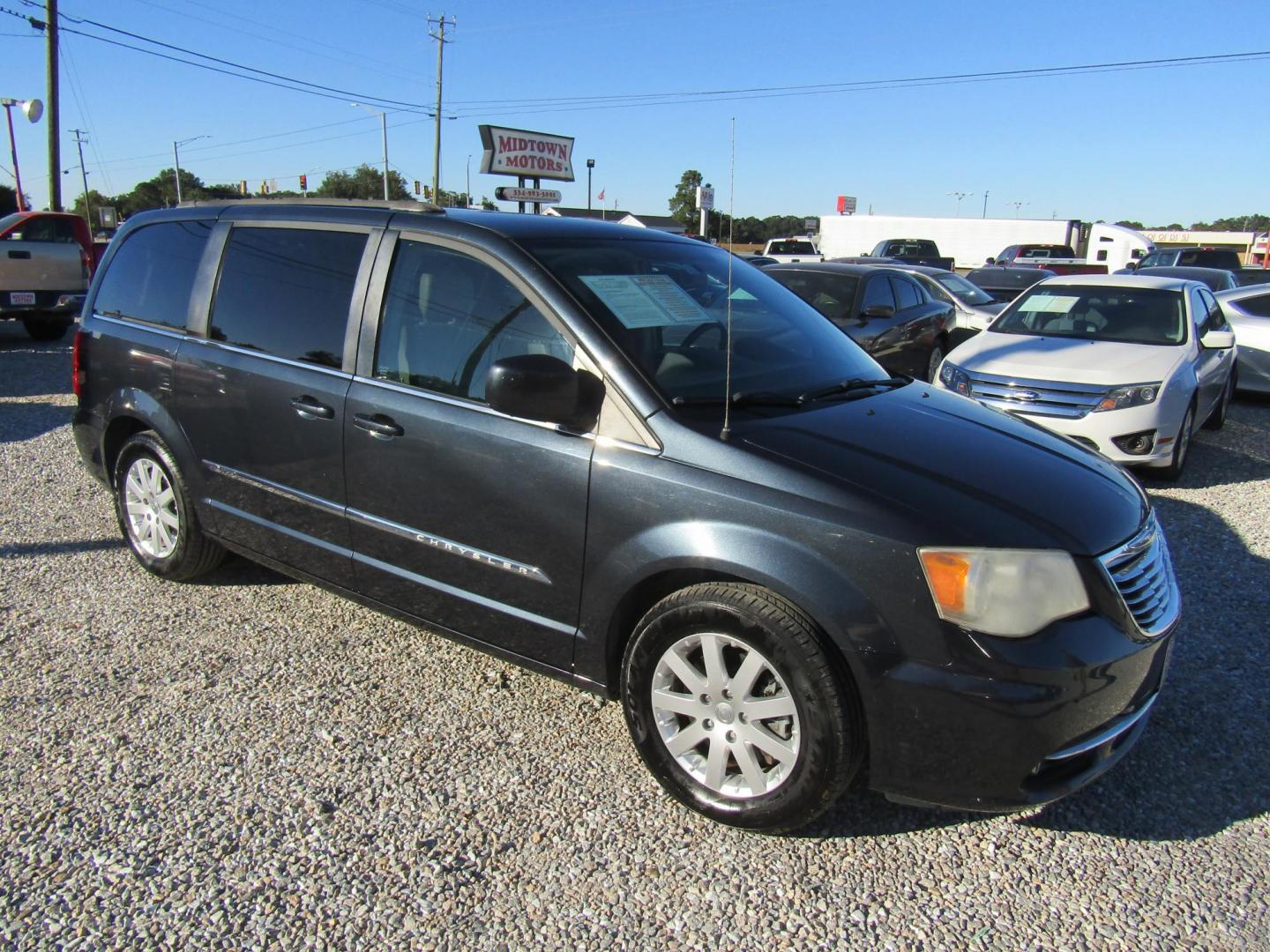 2013 Black Chrysler Town & Country Touring (2C4RC1BGXDR) with an 3.6L V6 DOHC 24V engine, Automatic transmission, located at 15016 S Hwy 231, Midland City, AL, 36350, (334) 983-3001, 31.306210, -85.495277 - Photo#0