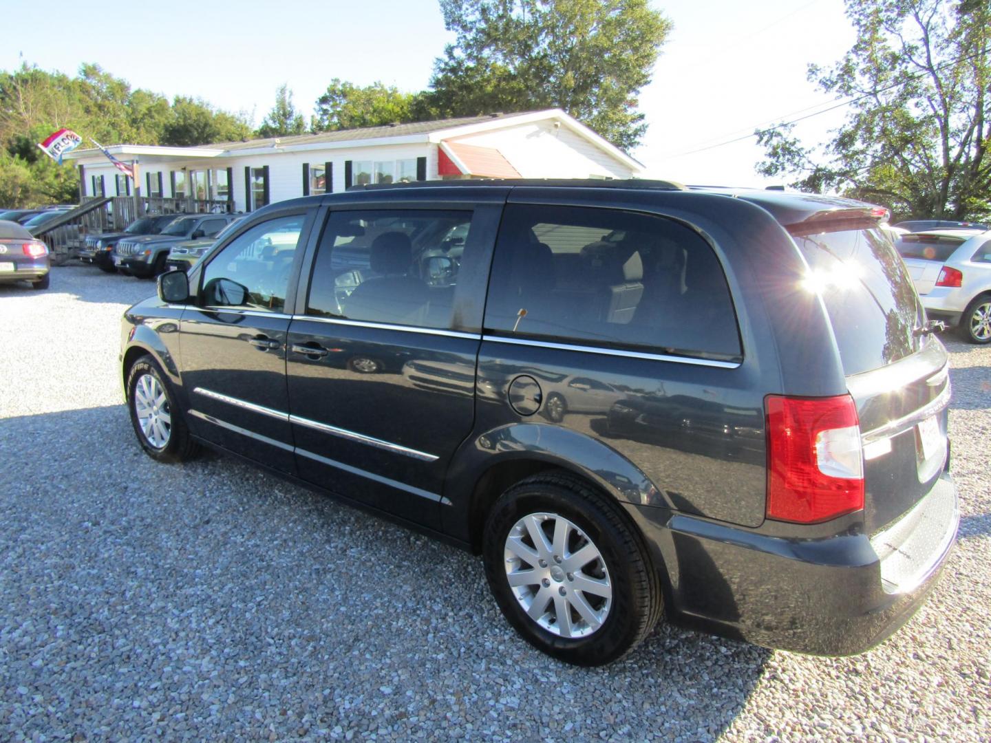 2013 Black Chrysler Town & Country Touring (2C4RC1BGXDR) with an 3.6L V6 DOHC 24V engine, Automatic transmission, located at 15016 S Hwy 231, Midland City, AL, 36350, (334) 983-3001, 31.306210, -85.495277 - Photo#3