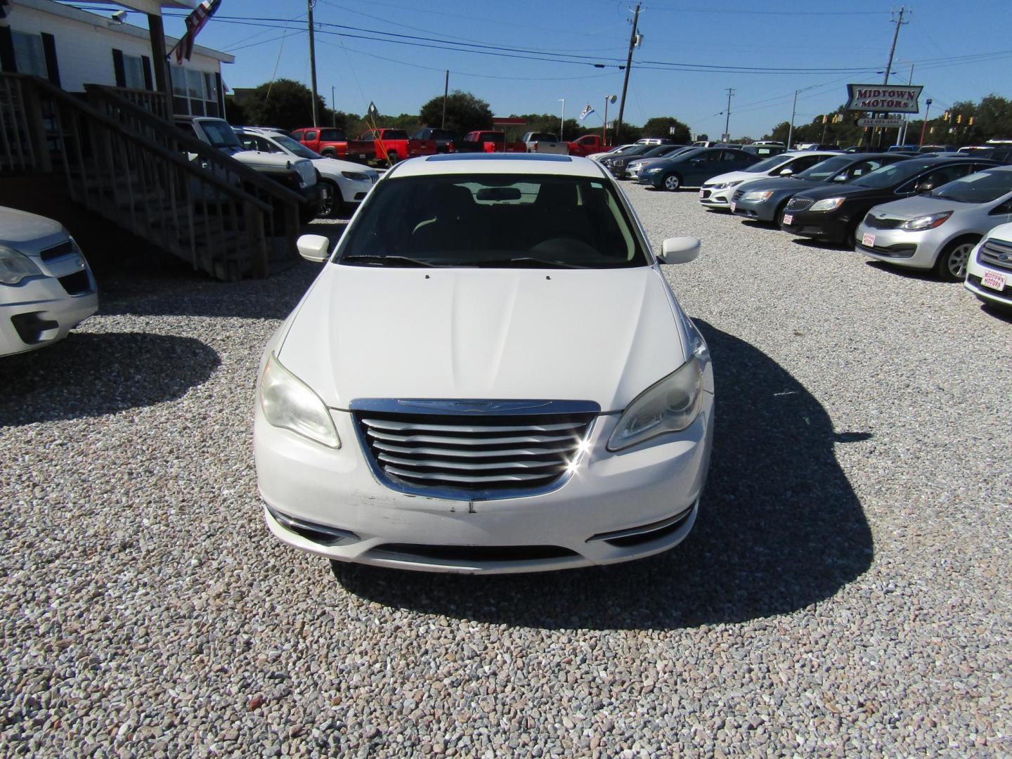 2011 White Chrysler 200 Touring (1C3BC1FGXBN) with an 3.6L V6 DOHC 24V engine, Automatic transmission, located at 15016 S Hwy 231, Midland City, AL, 36350, (334) 983-3001, 31.306210, -85.495277 - Photo#1