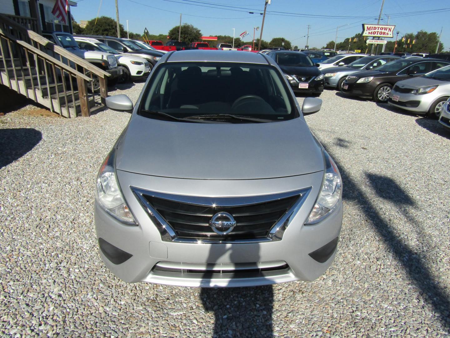 2015 Silver Nissan Versa 1.6 S 5M (3N1CN7AP0FL) with an 1.6L L4 DOHC 16V engine, Automatic transmission, located at 15016 S Hwy 231, Midland City, AL, 36350, (334) 983-3001, 31.306210, -85.495277 - Photo#1