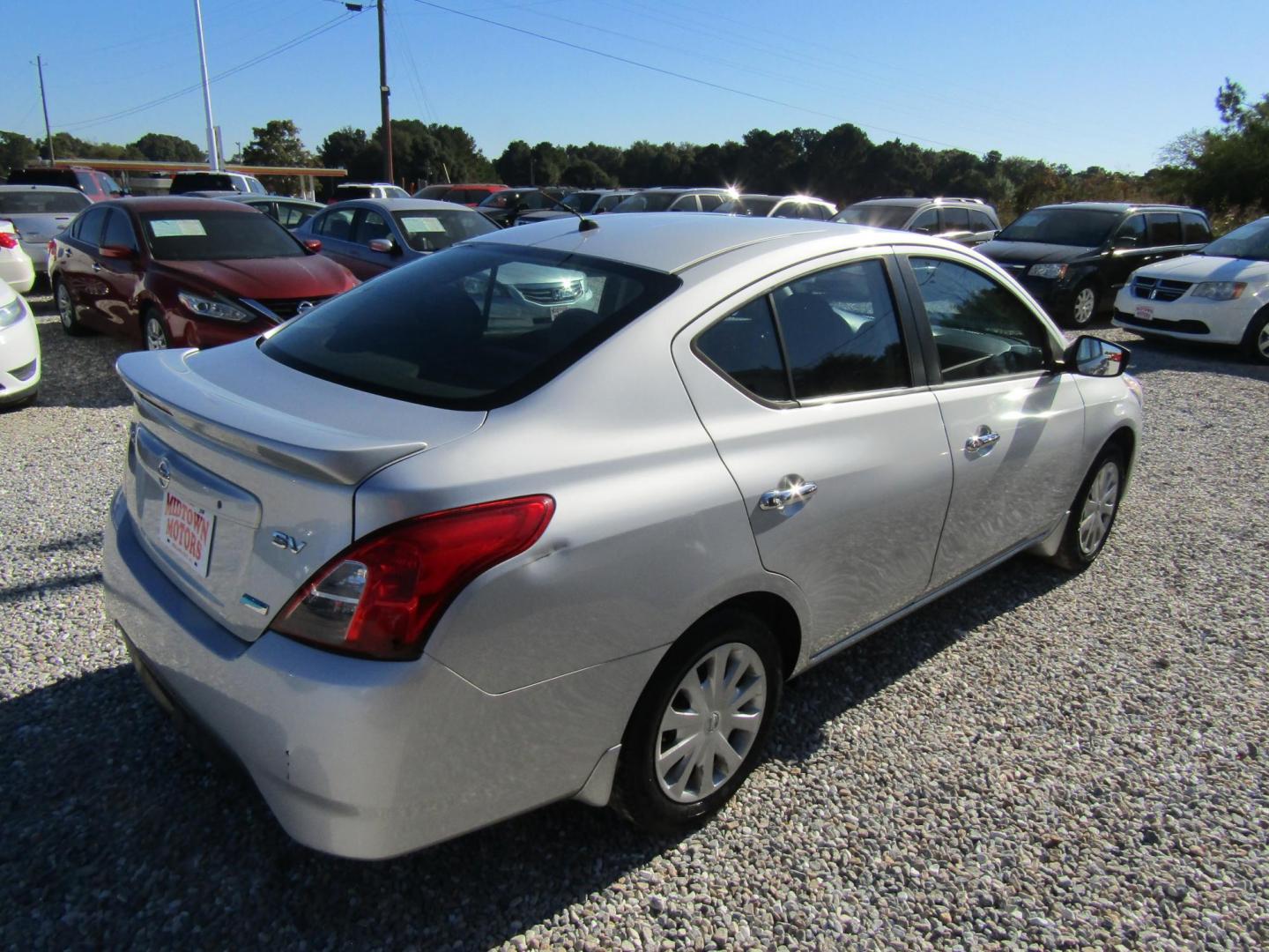 2015 Silver Nissan Versa 1.6 S 5M (3N1CN7AP0FL) with an 1.6L L4 DOHC 16V engine, Automatic transmission, located at 15016 S Hwy 231, Midland City, AL, 36350, (334) 983-3001, 31.306210, -85.495277 - Photo#7