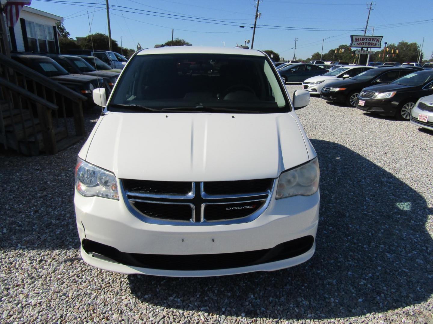 2013 White Dodge Grand Caravan SXT (2C4RDGCG0DR) with an 3.6L V6 DOHC 24V engine, Automatic transmission, located at 15016 S Hwy 231, Midland City, AL, 36350, (334) 983-3001, 31.306210, -85.495277 - Photo#2