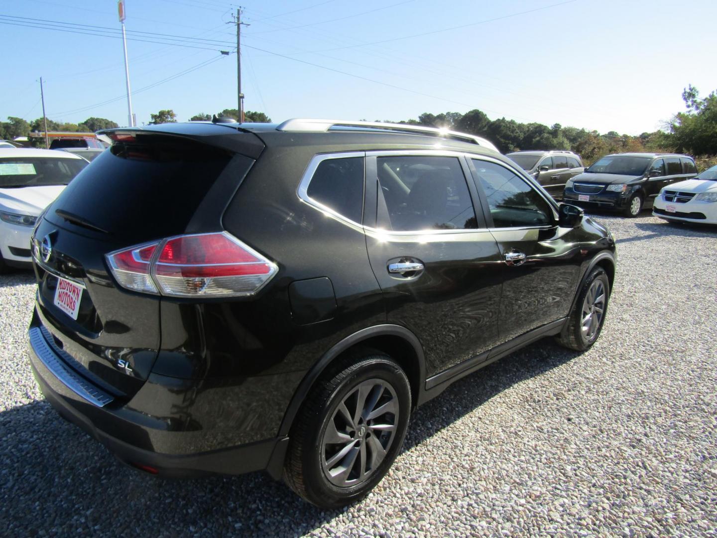 2016 Black Nissan Rogue S 2WD (5N1AT2MT7GC) with an 2.5L L4 DOHC 16V engine, Automatic transmission, located at 15016 S Hwy 231, Midland City, AL, 36350, (334) 983-3001, 31.306210, -85.495277 - Photo#6