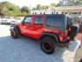 2017 Red Jeep Wrangler Unlimited Sport 4WD (1C4BJWDG5HL) with an 3.6L V6 DOHC 24V FFV engine, Automatic transmission, located at 15016 S Hwy 231, Midland City, AL, 36350, (334) 983-3001, 31.306210, -85.495277 - Photo#6