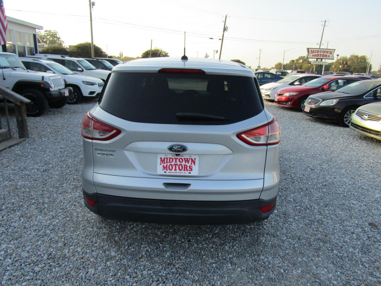 2016 Silver Ford Escape S FWD (1FMCU0F72GU) with an 2.5L L4 DOHC 16V engine, Automatic transmission, located at 15016 S Hwy 231, Midland City, AL, 36350, (334) 983-3001, 31.306210, -85.495277 - Photo#6