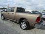 2009 Gold Dodge Ram 1500 SLT Quad Cab 2WD (1D3HB18P29S) with an 4.7L V8 SOHC 16V FFV engine, Automatic transmission, located at 15016 S Hwy 231, Midland City, AL, 36350, (334) 983-3001, 31.306210, -85.495277 - Photo#5