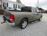 2009 Gold Dodge Ram 1500 SLT Quad Cab 2WD (1D3HB18P29S) with an 4.7L V8 SOHC 16V FFV engine, Automatic transmission, located at 15016 S Hwy 231, Midland City, AL, 36350, (334) 983-3001, 31.306210, -85.495277 - Photo#7